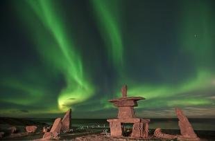 photo of Aurora Borealis Inukshuk Northern Lights Picture