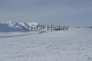 photo of alaska oil pipeline arctic winter