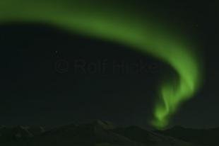 photo of Aurora borealis Photo Alaska Mountains