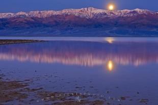 photo of Moonrise Reflections Badwater Basin Death Valley