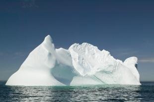 photo of Open Sea Floating Iceberg Photo