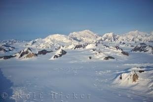 photo of Snow Covered Rock Formations Mountainous Landscape Yukon