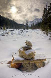 photo of Stone Cairn Rocky Mountain Winter Scenery
