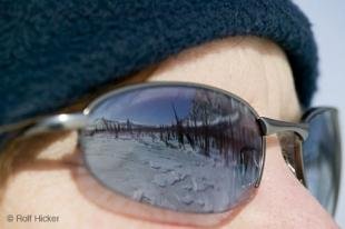 photo of Winter Snow Scenes Reflecting in Sun Glasses