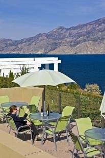 photo of Woman Wine Tasting Overlooking Okanagan Lake Scenic Winery Bonitas